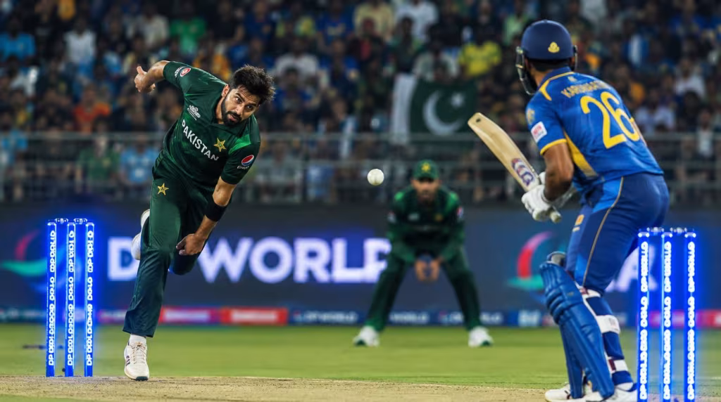 pak vs sl cricket match action shot Pakistan bowler and Sri Lanka batsman